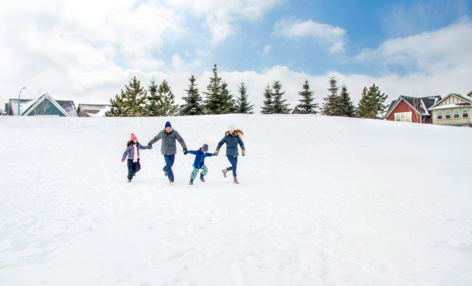 Winter fun in a neighbourhood park in Mahogany 